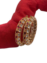 Aakruti Ruby Stone And Polki Bangles
